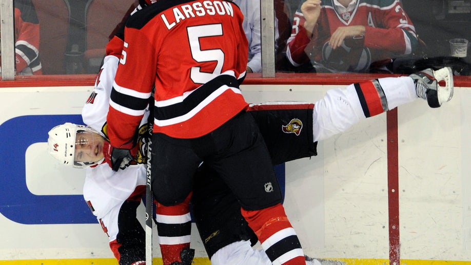 APTOPIX Senators Devils Hockey