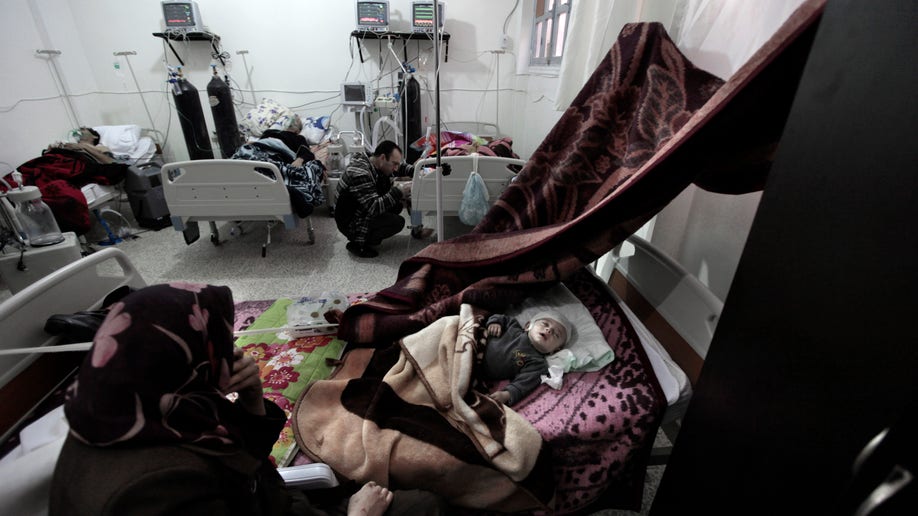 Mideast Syria War Wounded