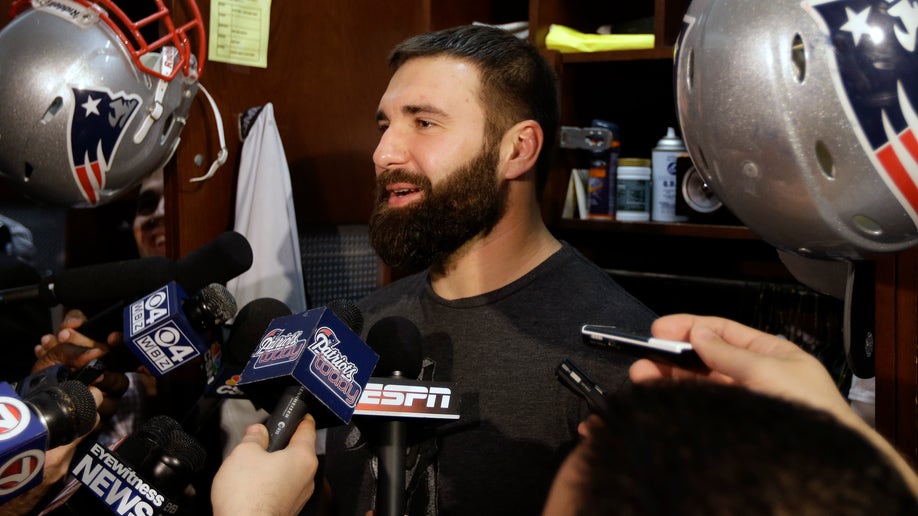 d9da7f54-Patriots Moving On Football