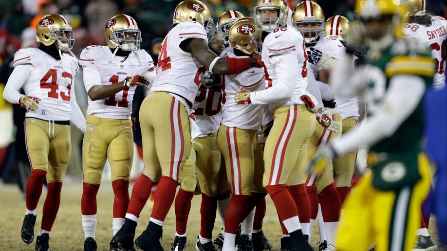 0b3db176-49ers Packers Football