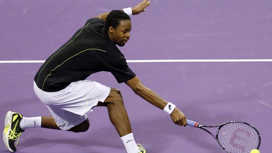 9032f815-Mideast Qatar ATP Open Tennis