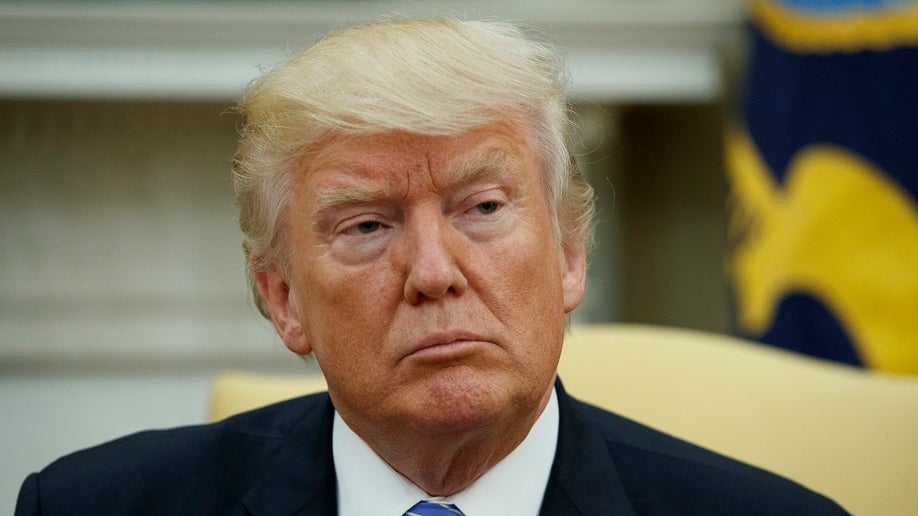 President Donald Trump listens during a meeting with Ukrainian President Petro Poroshenko in the Oval Office of the White House, Tuesday, June 20, 2017, in Washington. (AP Photo/Evan Vucci)