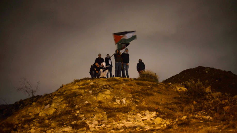 42c8f12b-Mideast Israel Palestinians