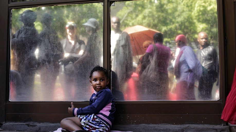 06a1fca8-South Africa Mandela Mourning