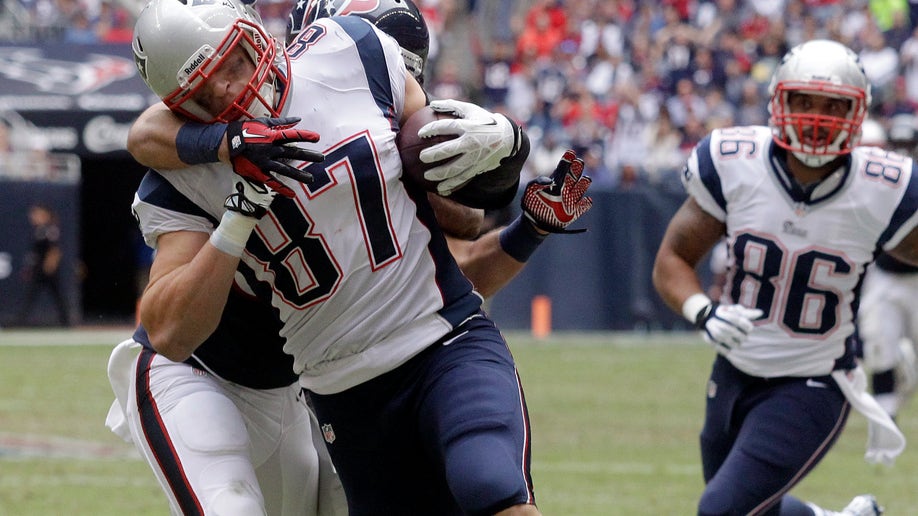 ef136a98-Patriots Texans Football