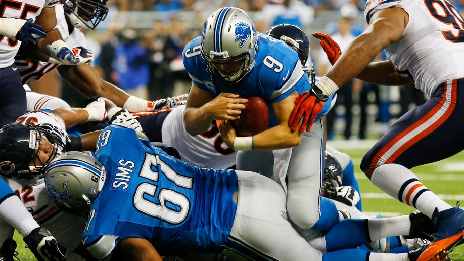 56d25566-Bears Lions Football