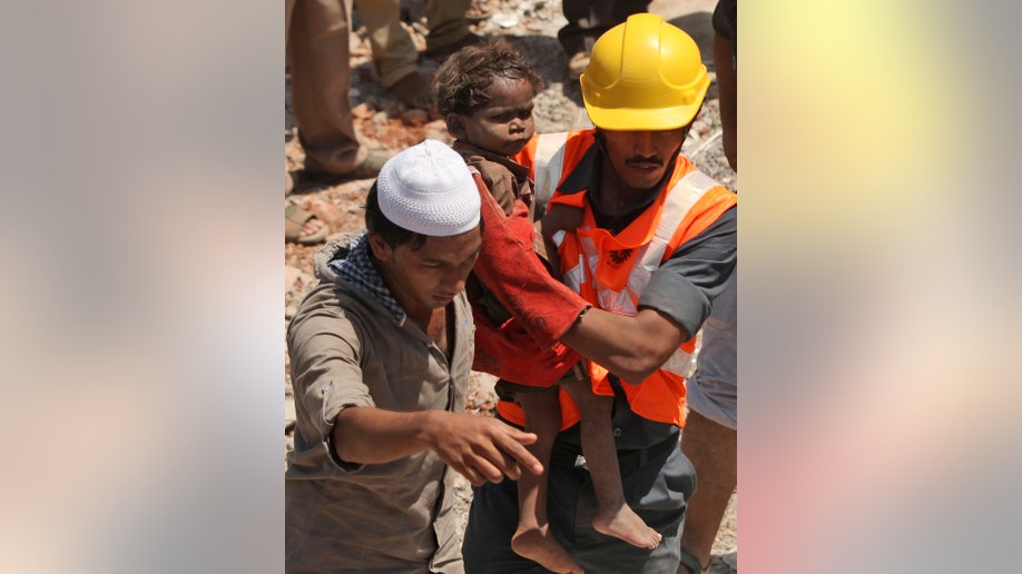 ad42c9dc-India Building Collapse