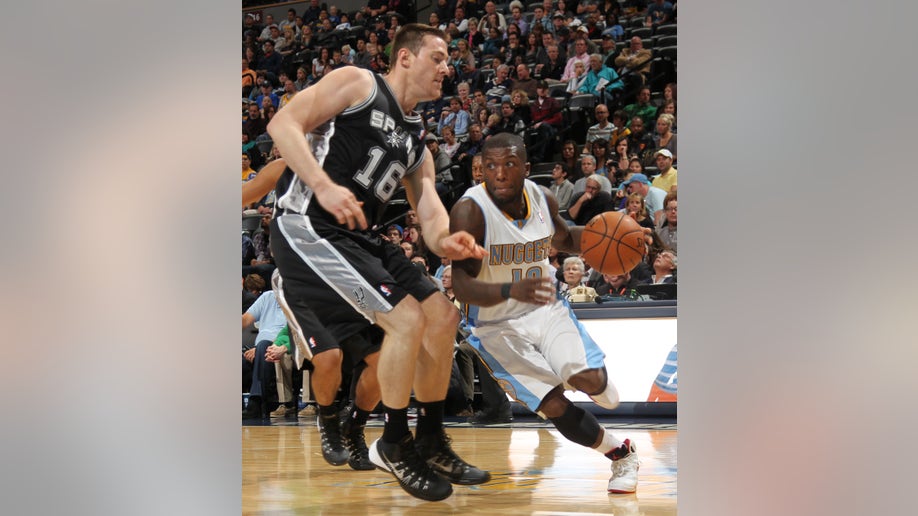 ed0a4a00-Spurs Nuggets Basketball