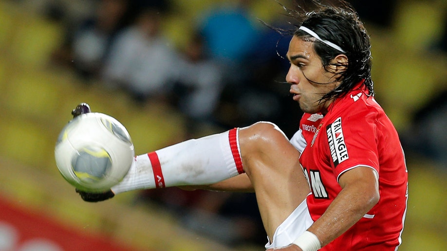 f0b0391f-Britain Soccer Man Utd Falcao