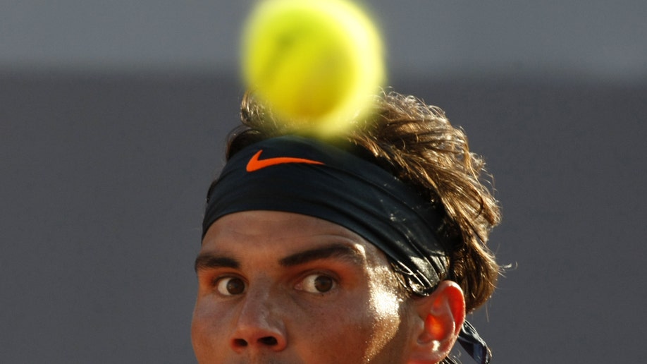 7e4d5fcc-Chile Tennis Nadal Returns