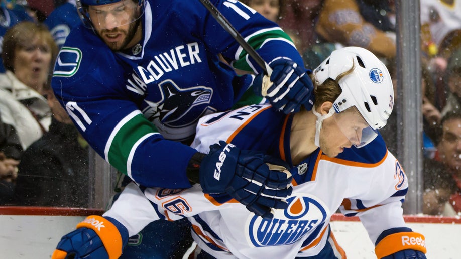 71c275f5-Oilers Canucks Hockey