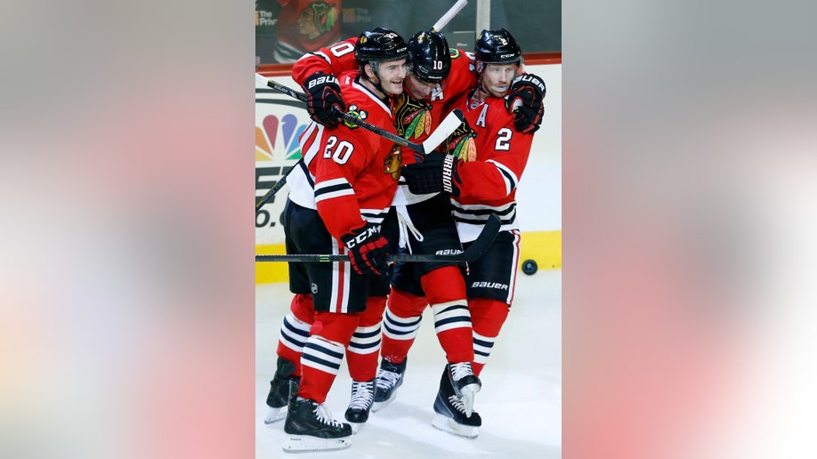 68db731b-Sharks Blackhawks Hockey