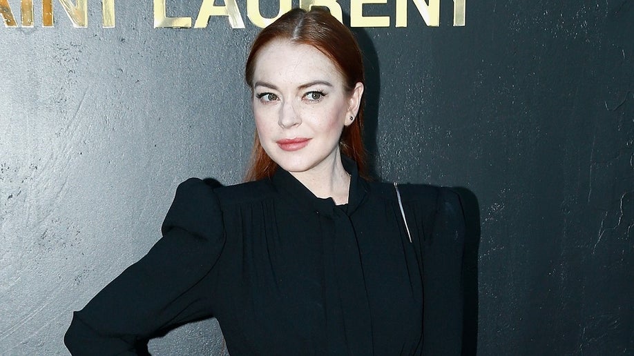 PARIS, FRANCE - SEPTEMBER 25: Lindsay Lohan attends the Saint Laurent show as part of the Paris Fashion Week Womenswear Spring/Summer 2019 on September 25, 2018 in Paris, France. (Photo by Julien Hekimian/Getty Images)