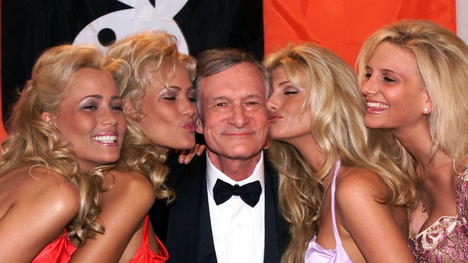 Hugh Hefner with Playboy Bunnies at Cannes