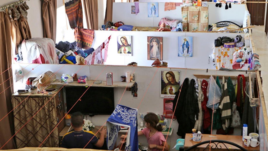 cd17e4d6-Mideast Jordan Iraqi Christians