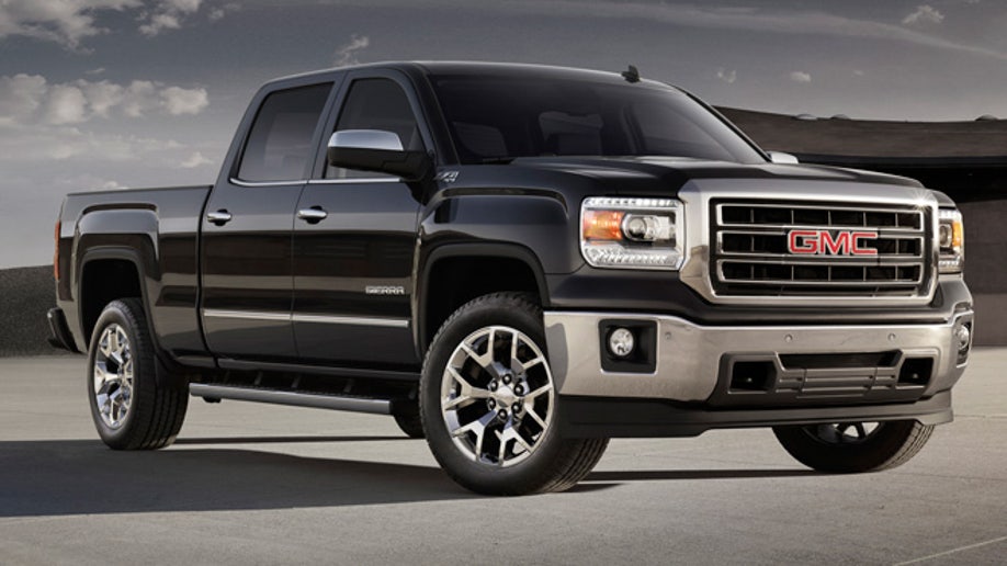 2014 GMC Sierra SLT Crew Cab Front Three Quarter in Iridium Metallic - on location