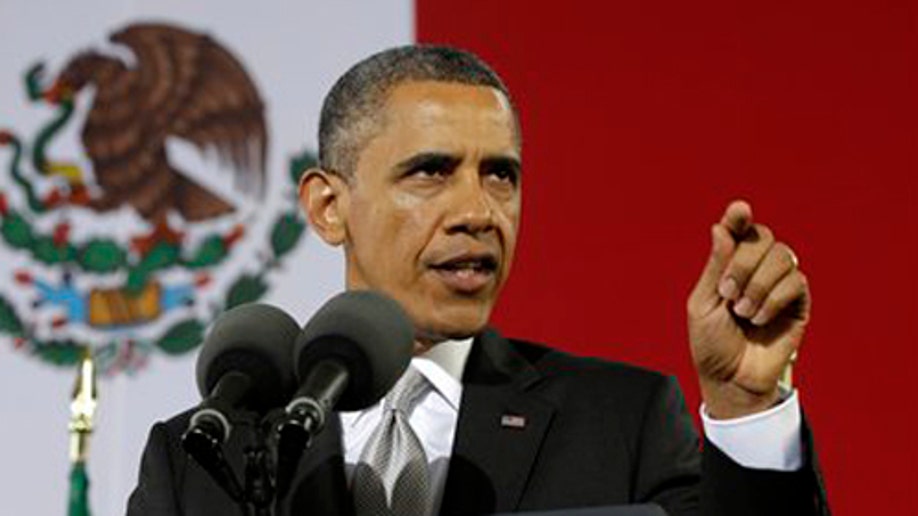 b1385da6-Obama US Mexico
