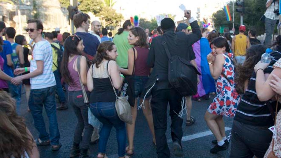 APTOPIX Mideast Israel Gay Parade Attacking