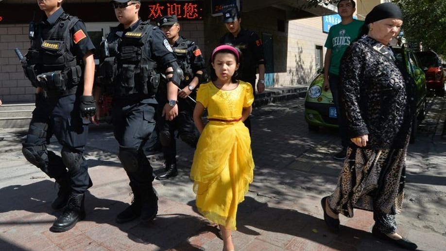 China 'terrorists' riot in latest Xinjiang clash Fox News