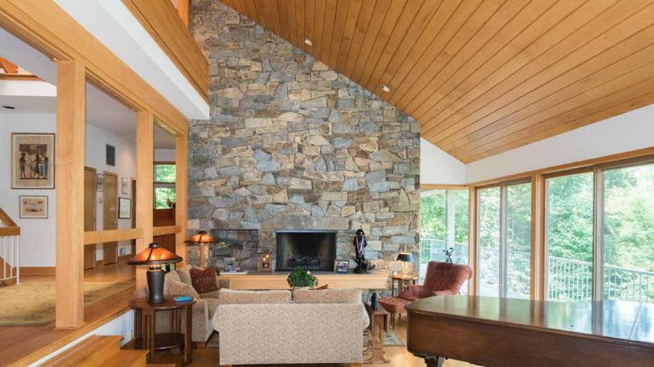 FX8434903 - Living Room w/ Stone Fireplace