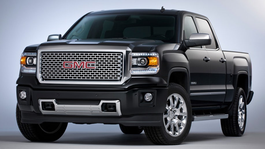 2014 GMC Sierra Denali Crew Cab Front Three Quarter in Iridium Metallic - in studio