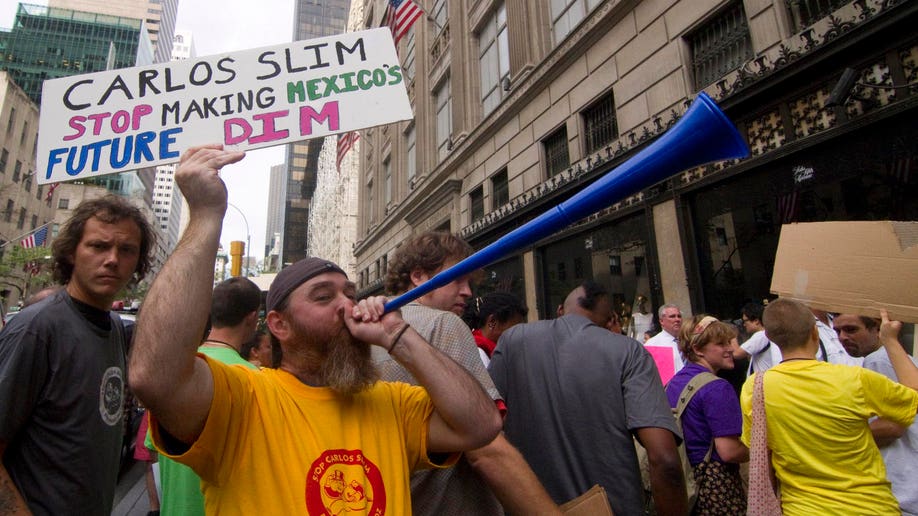 EEUU - OCUPA WAL STREET PROTESTA CONTRA CARLOS SLIM EN NUEVA YORK