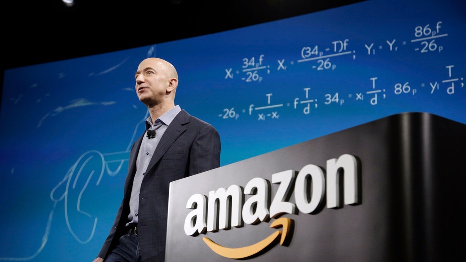 File photo - Amazon CEO Jeff Bezos discusses his company's new Fire smartphone at a news conference in Seattle, Washington June 18, 2014. 