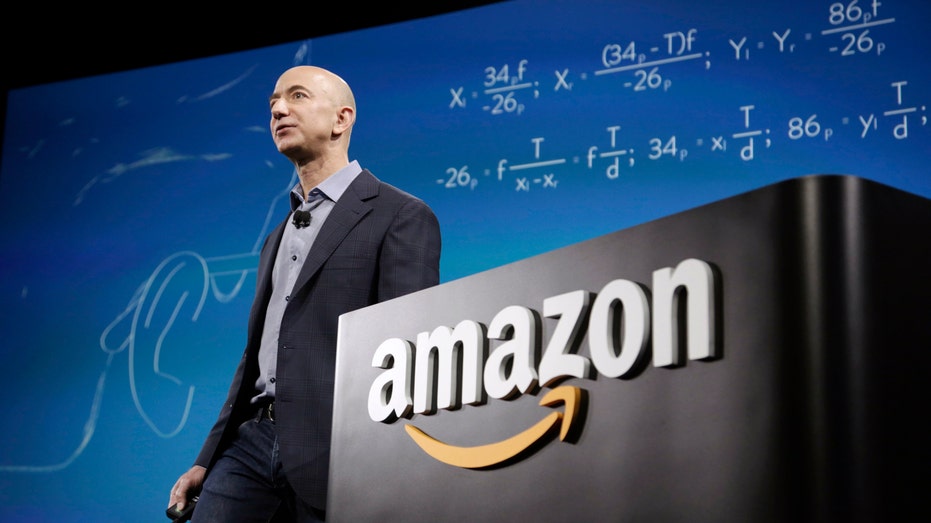 File photo - Amazon CEO Jeff Bezos discusses his company's new Fire smartphone at a news conference in Seattle, Washington June 18, 2014.