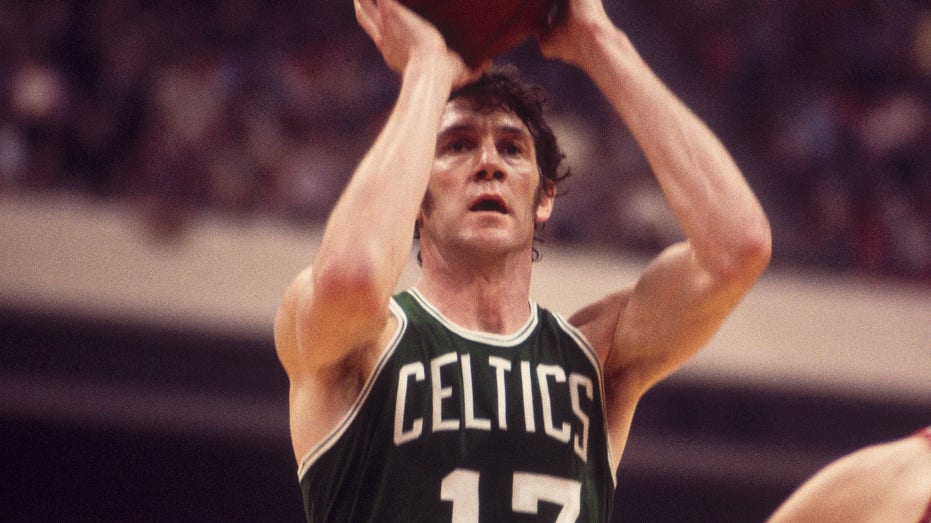 FILE - Boston Celtics John Havlicek on the way to a basket as New