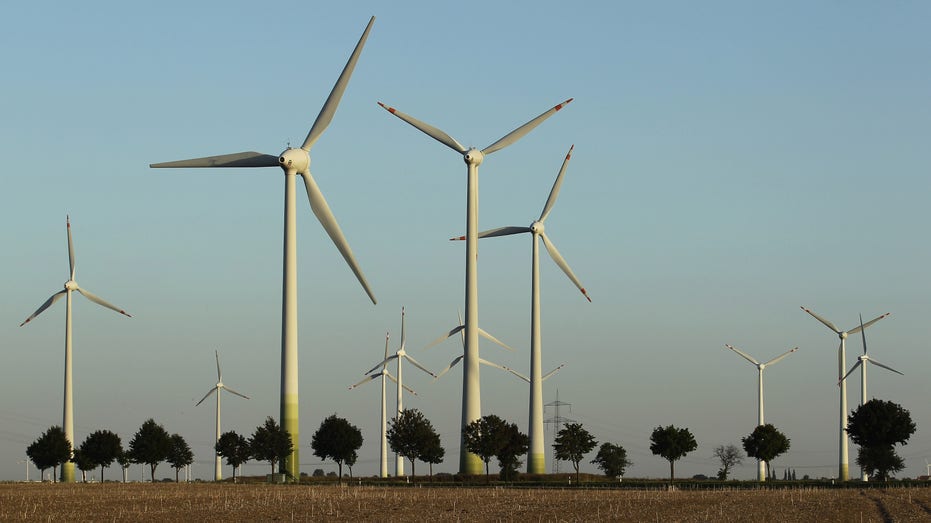 ROEDGEN, GERMANY - AUGUST 20: Wind turbines spin to produce electricity on August 20, 2010 in Roedgen near Bitterfeld, Germany. Germany is investing heavily in renewable energy production, including wind power and solar, and is seeking to produce 30% of its electricity nationwide with renewables by 2020. (Photo by Andreas Rentz/Getty Images)