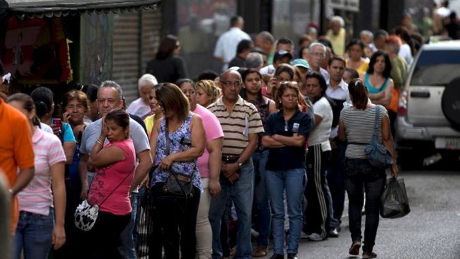 Venezuelans face extreme shortages with long line and strict quotas