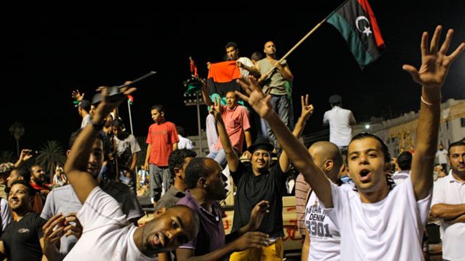 Libyan Rebel Fighters Take Tripoli