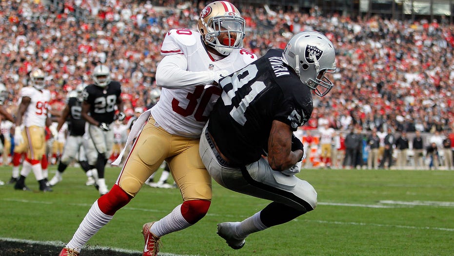 The Oakland Raiders' Mychal Rivera (81) celebrates a touchdown against the  Kansas City Chiefs in the third quarter at O.co Coliseum in Oakland,  Calif., on Sunday, Dec. 15, 2013. (Photo by Josie