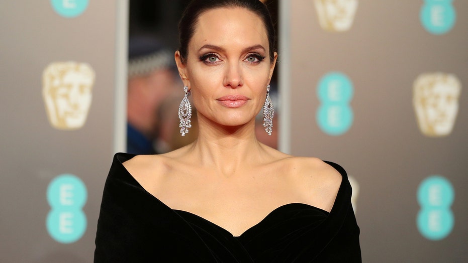 Angelina Jolie discusses life as a single mom: 'I've been alone a long time now'