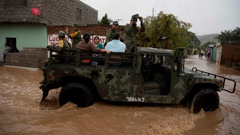 Mexico emerges after Hurricane Patricia soaked but safe