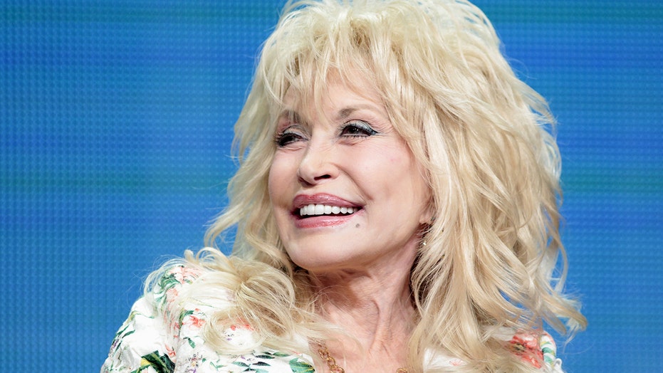 Dolly Parton celebrates Tennessee’s reopening amid pandemic at Dollywood, performs ‘Coat of Many Colors’