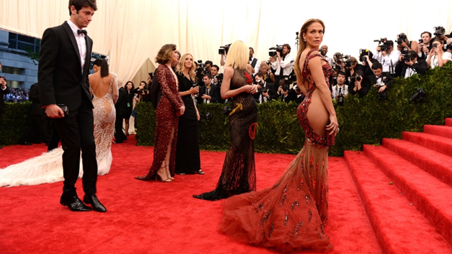 Carolina Herrera slams 'almost naked' red carpet dresses worn by JLo,  Beyonce | Fox News