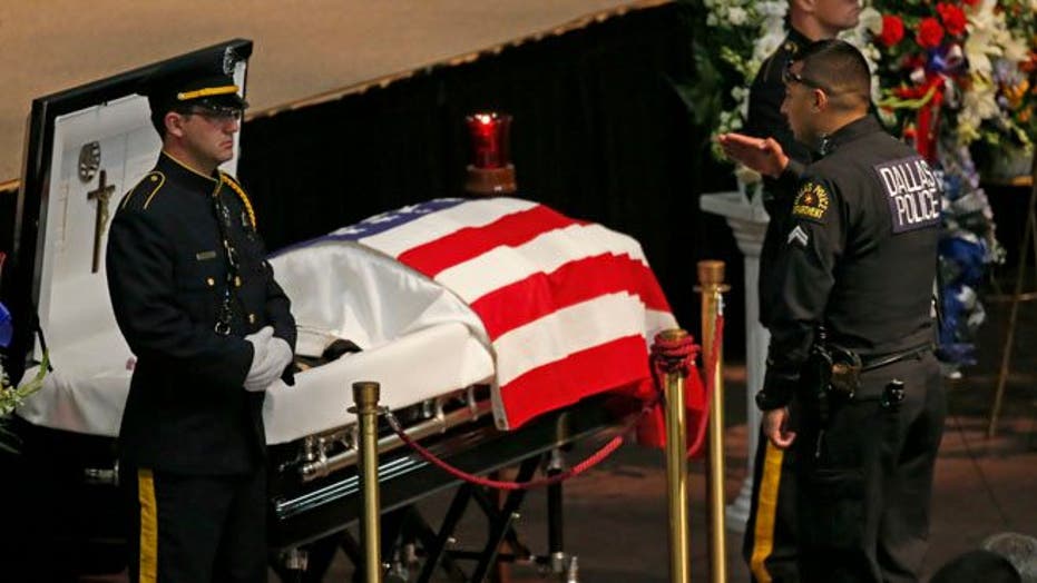 Law enforcement, Navy personnel mourn slain Dallas officer