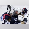 Gigi Marvin of the United States, with her teammates after scoring a goal against Finland in their ice hockey game at the 2018 Winter Olympics