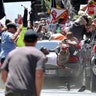 People are hit as a vehicle drives into a group of protesters demonstrating against a white nationalist rally in Charlottesville, August 12, 2017