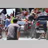 People are hit as a vehicle drives into a group of protesters demonstrating against a white nationalist rally in Charlottesville, August 12, 2017