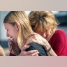 Santa Fe High School student Dakota Shrader is comforted by her mother Susan Davidson following a shooting at the school, May 18, 2018