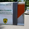 NJ State Park police block the entrance to Bulls Island state recreation area during the state government shutdown in Stockton, N.J., July 2