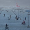 Participants explore the playa at the annual Burning Man arts and music festival in the Black Rock Desert of Nevada, August 28