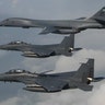 A U.S. Air Force B-1B Lancer is joined by Republic of Korea Air Force F-15 jets during a 10-hour training mission over the Korean Peninsula