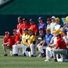 Wearing mostly Louisiana State University hats, the Republican team poses for a team picture before the Congressional baseball game
