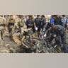 Iraqi Personnel Investigate Blast