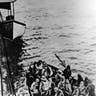 14th April 1912: Survivors of the 'Titanic' disaster nearing the 'Carpathia', in a lifeboat. The arrow points to Joseph Bruce Ismay, chairman of the White Star Line. (Photo by General Photographic Agency/Getty Images)