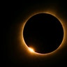 The moon passes in front of the sun for a total solar eclipse in Farmington, Missouri