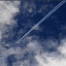 A airplane flies over Hawaii's Kilauea volcano seen from the International Space Station on May 13, 2018